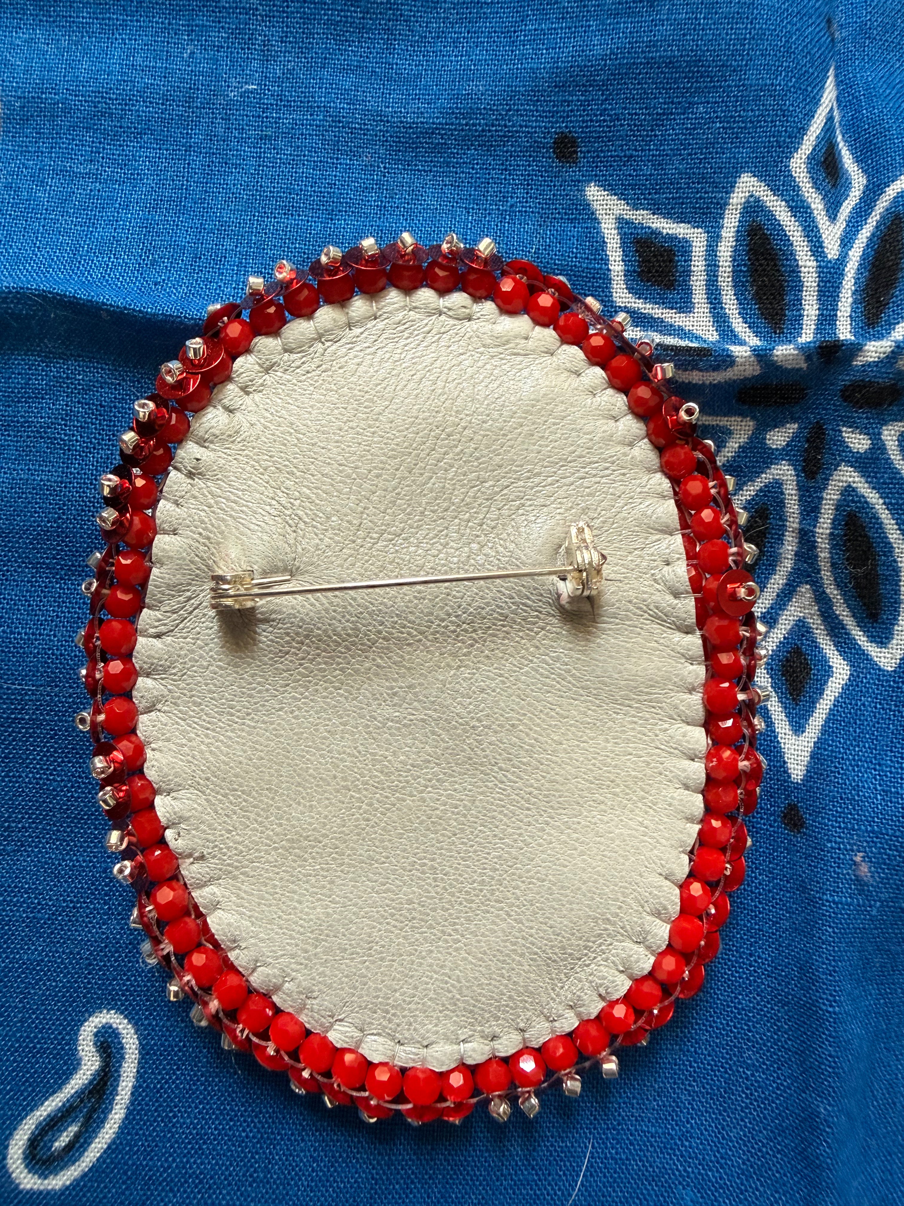Broche Snoopy rouge